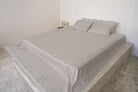 Misty Dove Gray bamboo sheet set on a queen bed (colour visualisation)