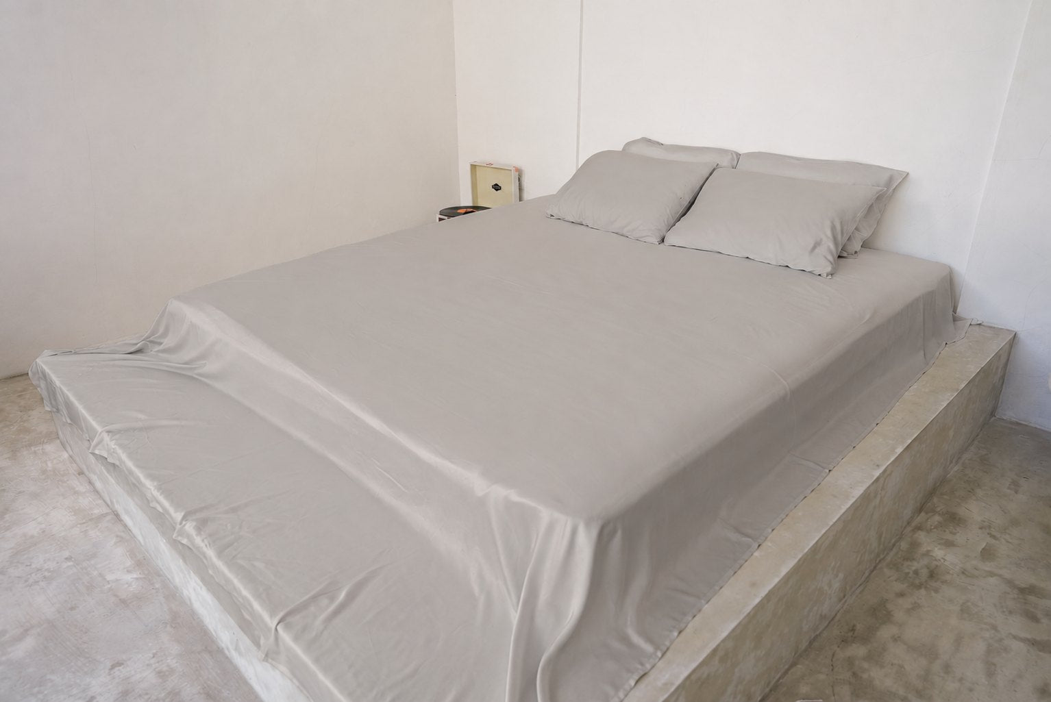 Misty Dove Gray bamboo sheet set on a queen bed